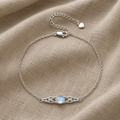 Eingelassenes Rundes Mondstein-Armband