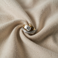 Unregelmässiger gold- und silberfarbener Ring