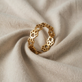 Verstellbarer Fussabdruck-Ring aus Olivenholz – hergestellt aus rostfreiem Stahl.