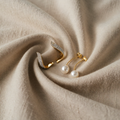 Elegante, handgefertigte Goldohrringe mit Perle