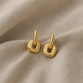 Minimalistische zweifarbige goldene Ohrhänger, oval