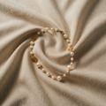 Elegante goldbeschichtete Perlenkette