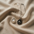 Halskette mit Perle und Muschelkette mit maritimem Anhänger