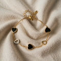 Emilia – Armband mit goldfarbenen Herzumrissen