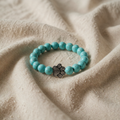 Armband mit Fussabdrücken und Natursteinen