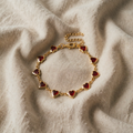 Goldenes Armband "Ophelyra Garnetelle"