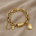 Gliederhalskette goldfarben mit Herzanhänger und Zylinder