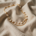 Perlenring mit feiner Kette