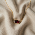 Goldkette mit ovalem Rubin